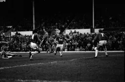 Brian Stein darts in for his goal