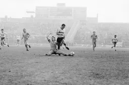 Brian Stein hurdles Stuart Pearce