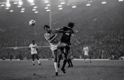Mick Harford grappling with the defender