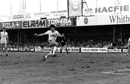 Mick Harford shoots over