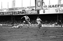 Mick Harford with a wild swing