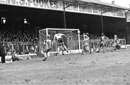 Mick Harford heads towards the Oak Road goal