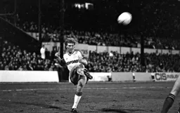 Tim Breacker gets in a cross