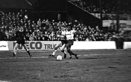 Tim Breacker tries to get past his man