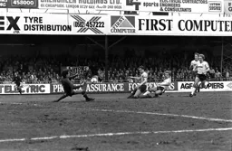 Wayne Turner slides the winner into the Watford net