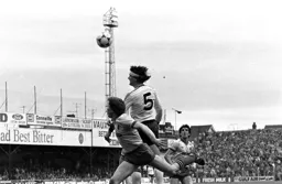 Steve Foster well above the Watford defender