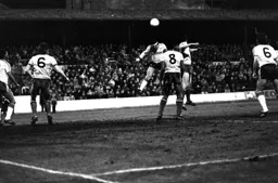 Steve Foster gets his head to the ball