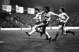 Mick Harford shoots for goal