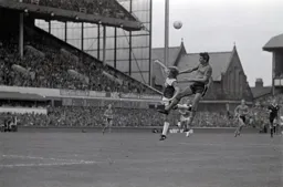 Mick Harford gets above Gary Stevens