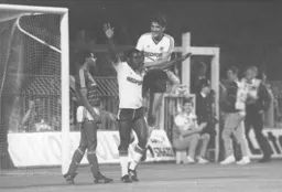Mick Harford congratulates Emeka Nwajiobi after he has scored the only goal in the game
