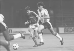 Mal Donaghy drives forward with the ball