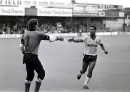 Brian Stein gets a handshake from Saints keeper Peter Shilton