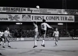 Steve Foster heads a corner towards goal