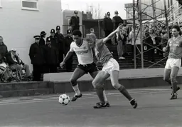 Brian Stein holds off a defender