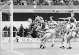 Mike Newell stoops to head in Town`s equaliser