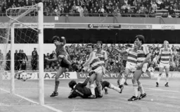 Mike Newell follows the ball into the net for the equalising goal