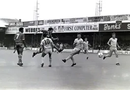 Mick Harford shoots from distance