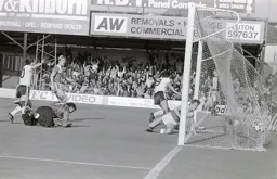 Mick Harford turns the ball home