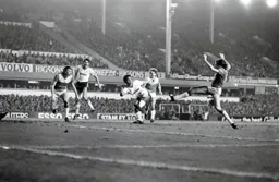 Mark Stein shoots from just outside the six yard box