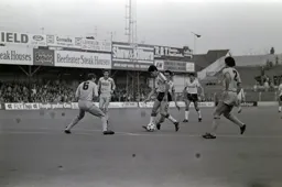 Mike Newell surrounded