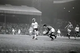Tim Breacker makes a rush forward but United keeper Chris Turner safely gathers the ball