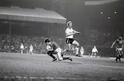 Tim Breacker is beaten to the ball by United keeper Chris Turner