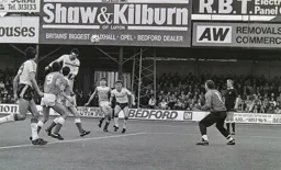 Steve Foster powers his header into the net for Town’s first