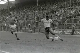 Mitchell Thomas gets a cross in