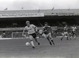 Tim Breacker moves away from the defender