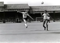 Tim Breacker heads for goal