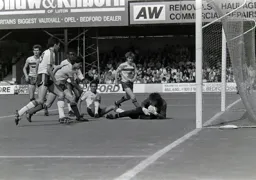 Watford's Tony Coton grasps the ball