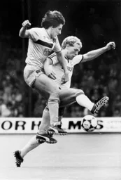 Tim Breacker in a tussle with Peter Beardsley