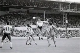Steve Foster heads the ball down towards Emeka Nwajiobi