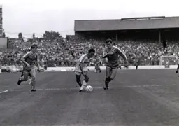 Brian Stein goes past Joe McLaughlin