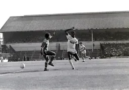 Former team mates Mark Stein and Mitchell Thomas leave the ball and go into a dance routine