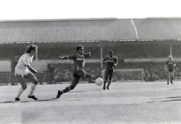 Mark Stein takes the ball away from Gary Mabbutt