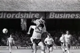 Steve Bruce climbs all over Mike Newell