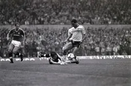 Brian Stein tries to take the ball around United keeper Chris Turner