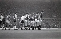 United form a defensive wall as the Town prepare to take a free kick