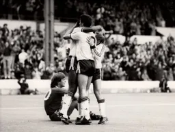 Ricky Hill is engulfed by Mike Newell and David Preece after scoring the third goal. Jan Molby sits out the party