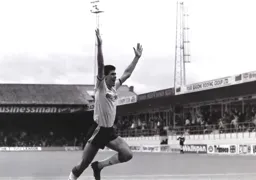Mike Newell celebrates after scoring his and Town`s first goal