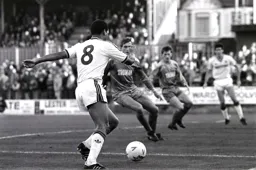 Brian Stein lines up a cross into the penalty area Mike Newell the intended target