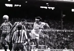 Steve Foster powers a header towards goal
