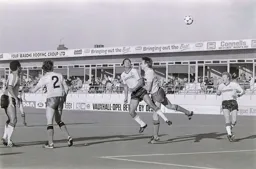 Brian Stein sends a header towards goal despite John McClelland`s close attention