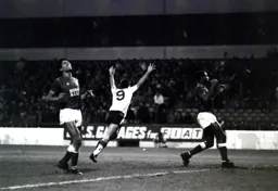 Mike Newell arms aloft wheels away to celebrate scoring Town`s second goal