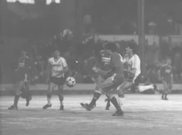Mick Harford forces Mark Lawrenson into a hasty clearence