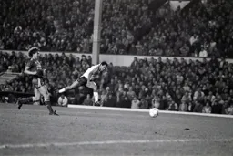 Brian Stein goes airbourne as he takes a shot at goal