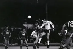 Steve Foster joins the attack and heads the ball towards goal