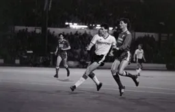 Mike Newell holds off Gary Gillespie to score the Town`s third goal