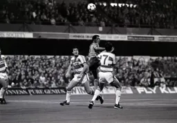 Brian Stein gets between Terry Fenwick and Martin Allen to win a header